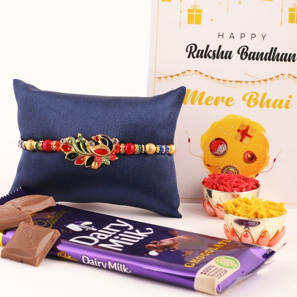 Elegant Peacock Rakhi and Cadbury