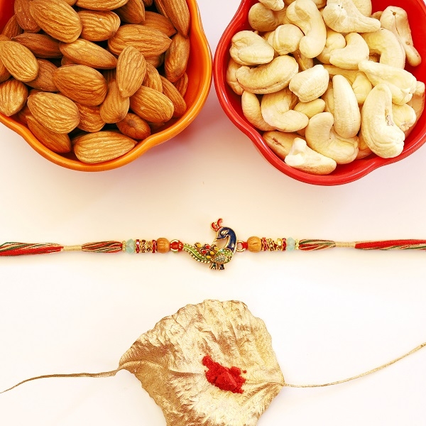 Beautiful Peacock Rakhi with Nuts