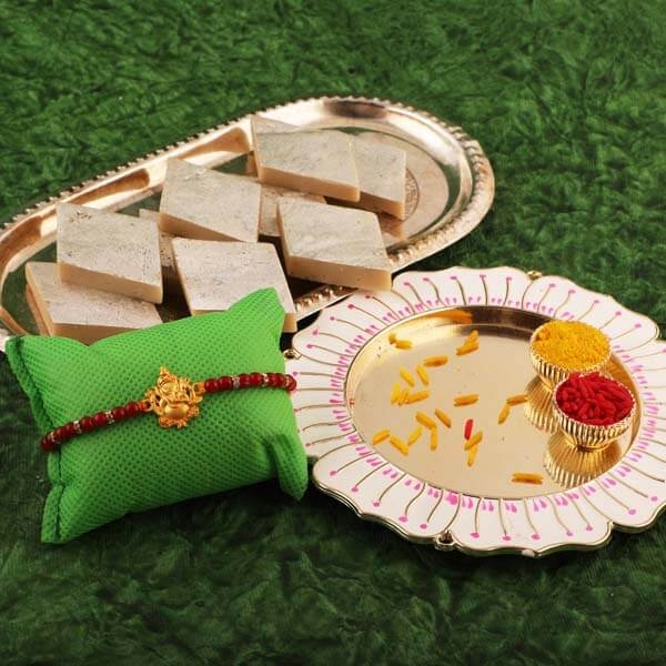 Thali with Ganesha Rakhi and Sweet