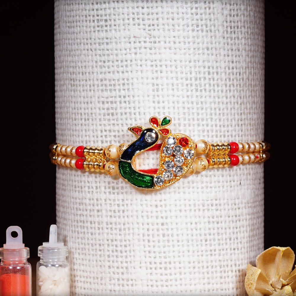 Beautiful Diamond Peacock Rakhi with Pearls