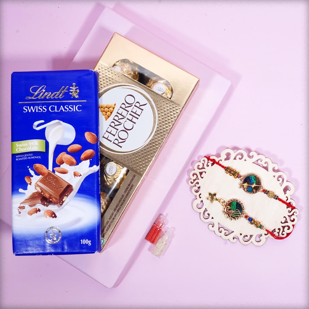 Exclusively Crafted Peacock Rakhi with Lindt Swiss Classic and Ferrero Rocher (8pcs)