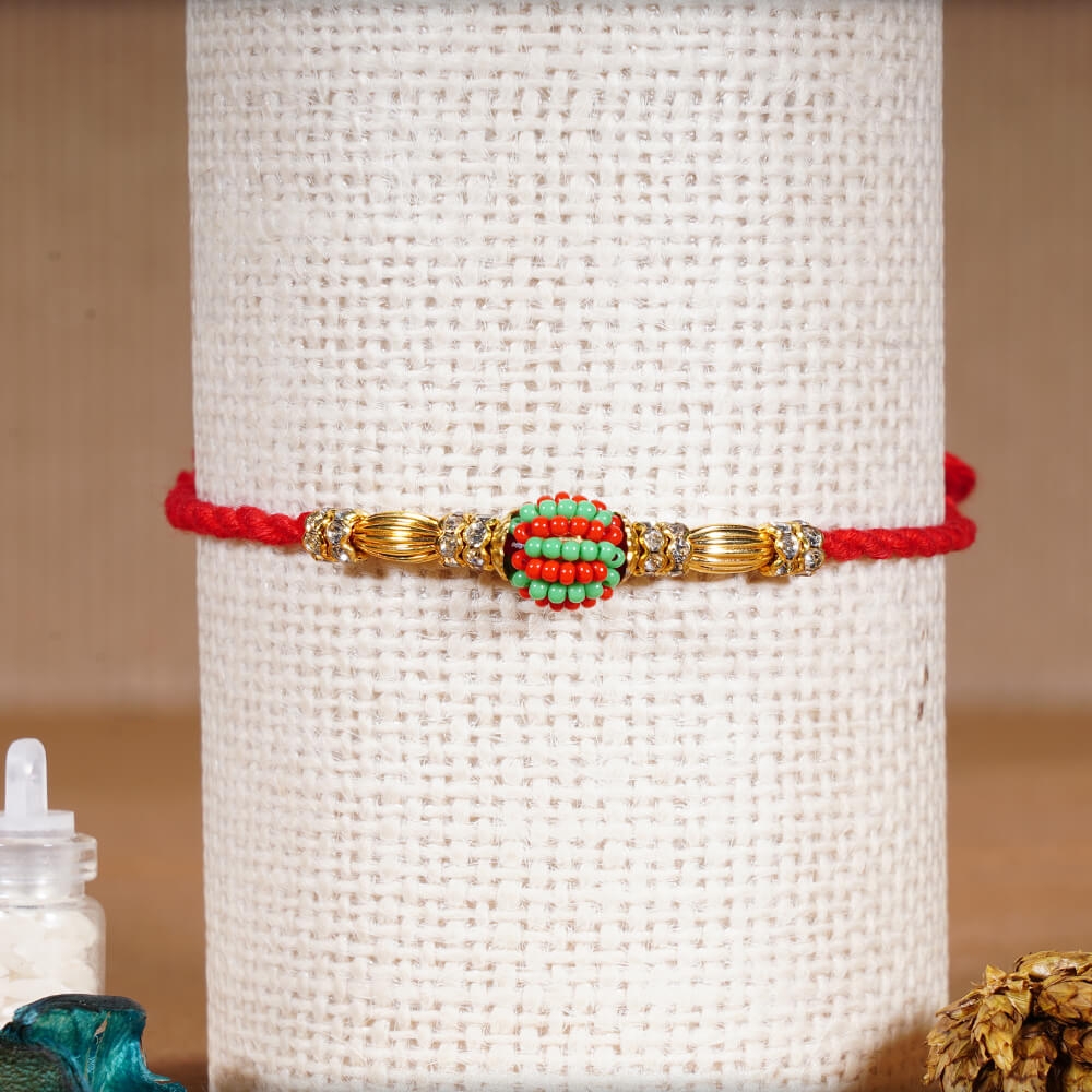 Delicate Designer Bead Golden Rakhi