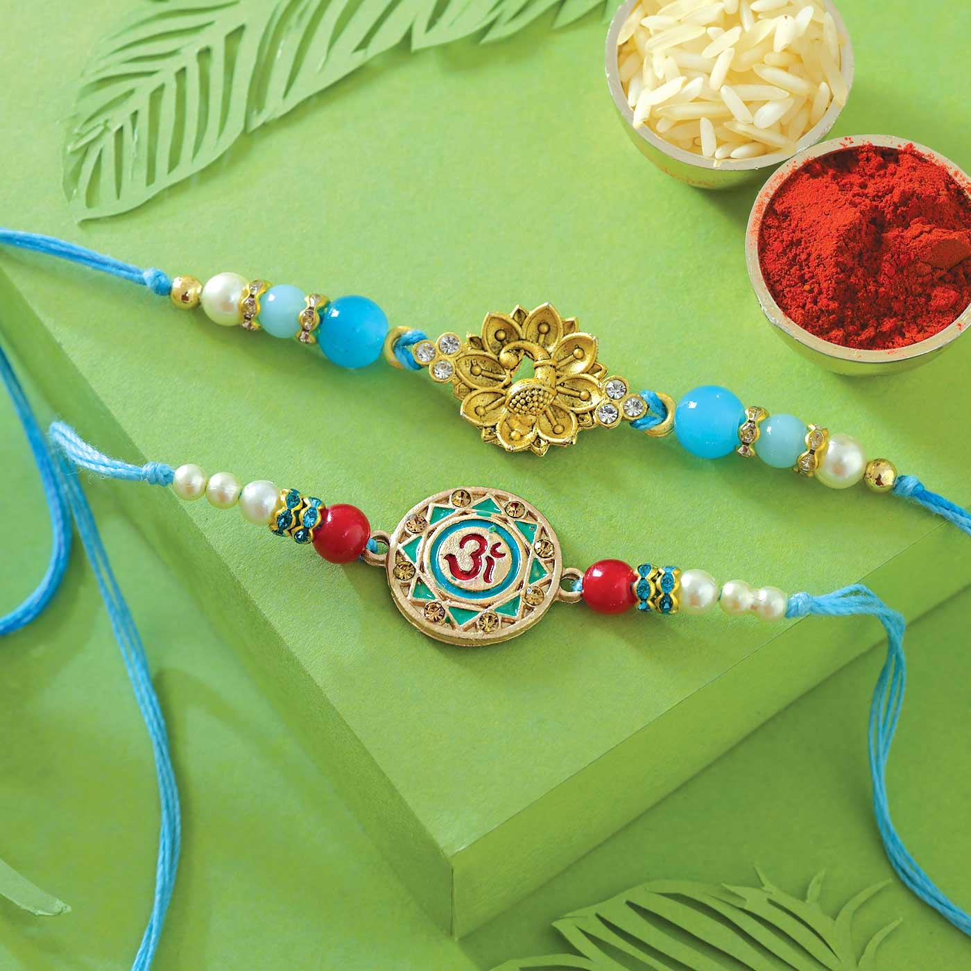 Om and Peacock Rakhi Set