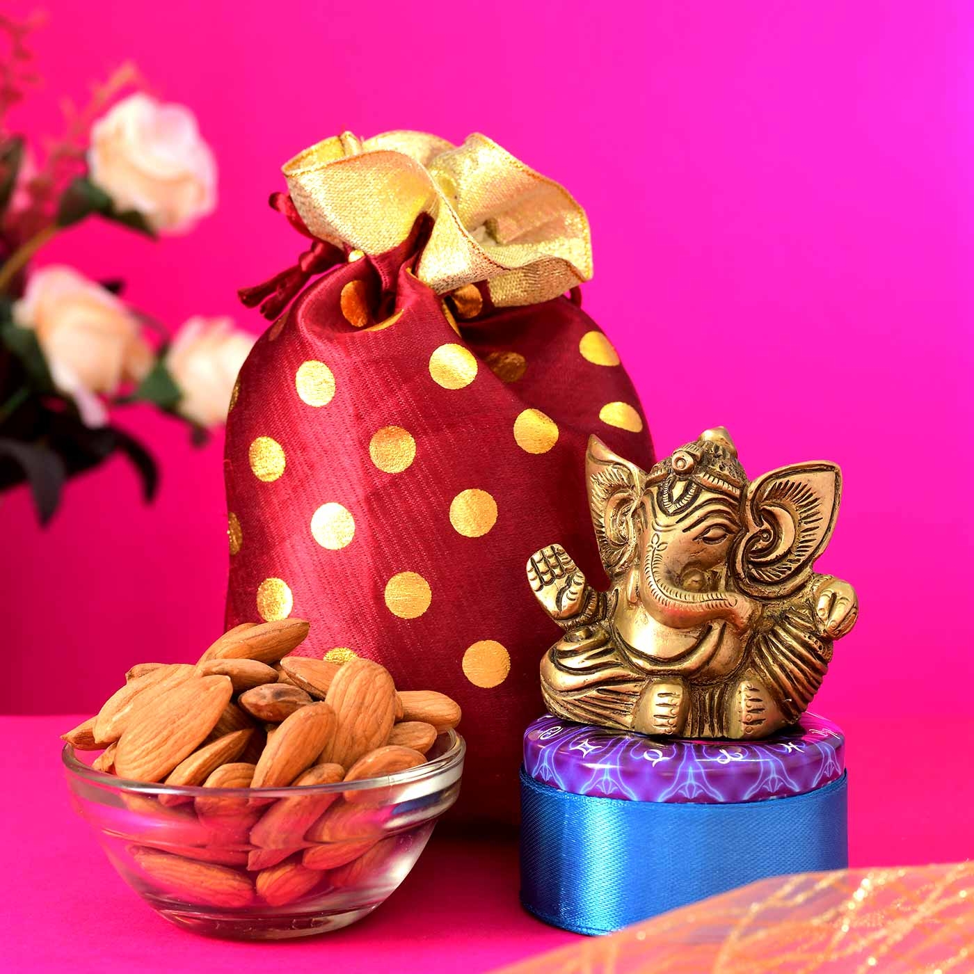 Brass Ganesha and Almonds